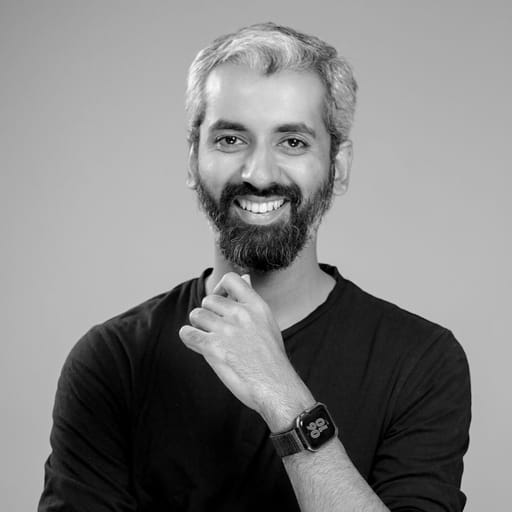 Sameer Ahmed Khan, black-and-white studio portrait